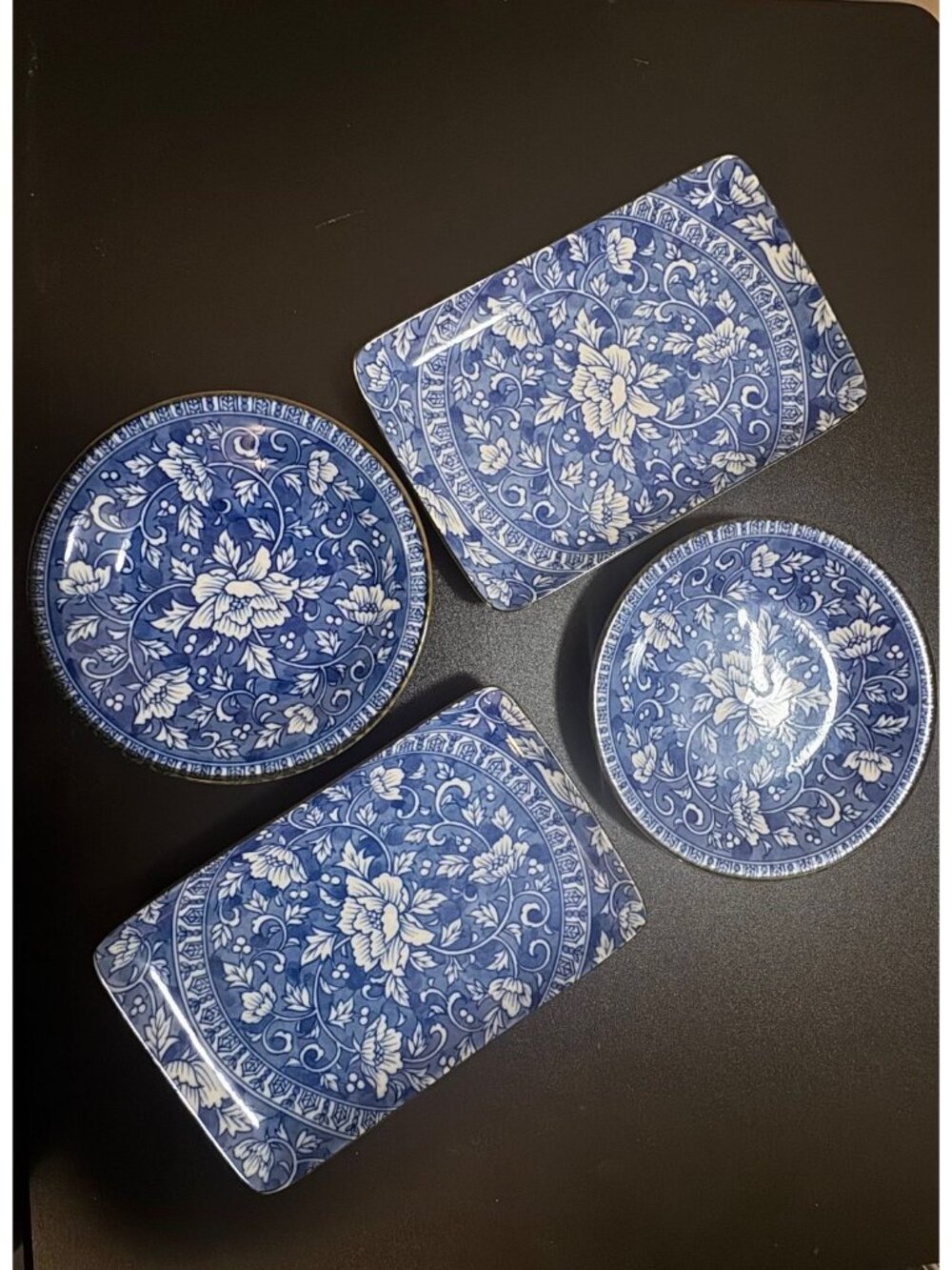 Vintage Japanese porcelain set of 4 plates, blue and white floral